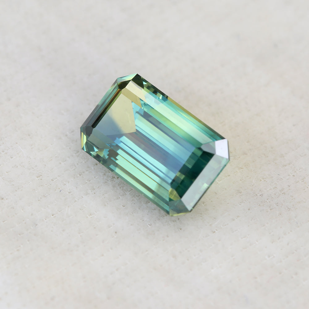 Fair Trade Emerald Cut Parti Sapphire - 8.40 x 4.96mm 1.59ct  SAEM24001