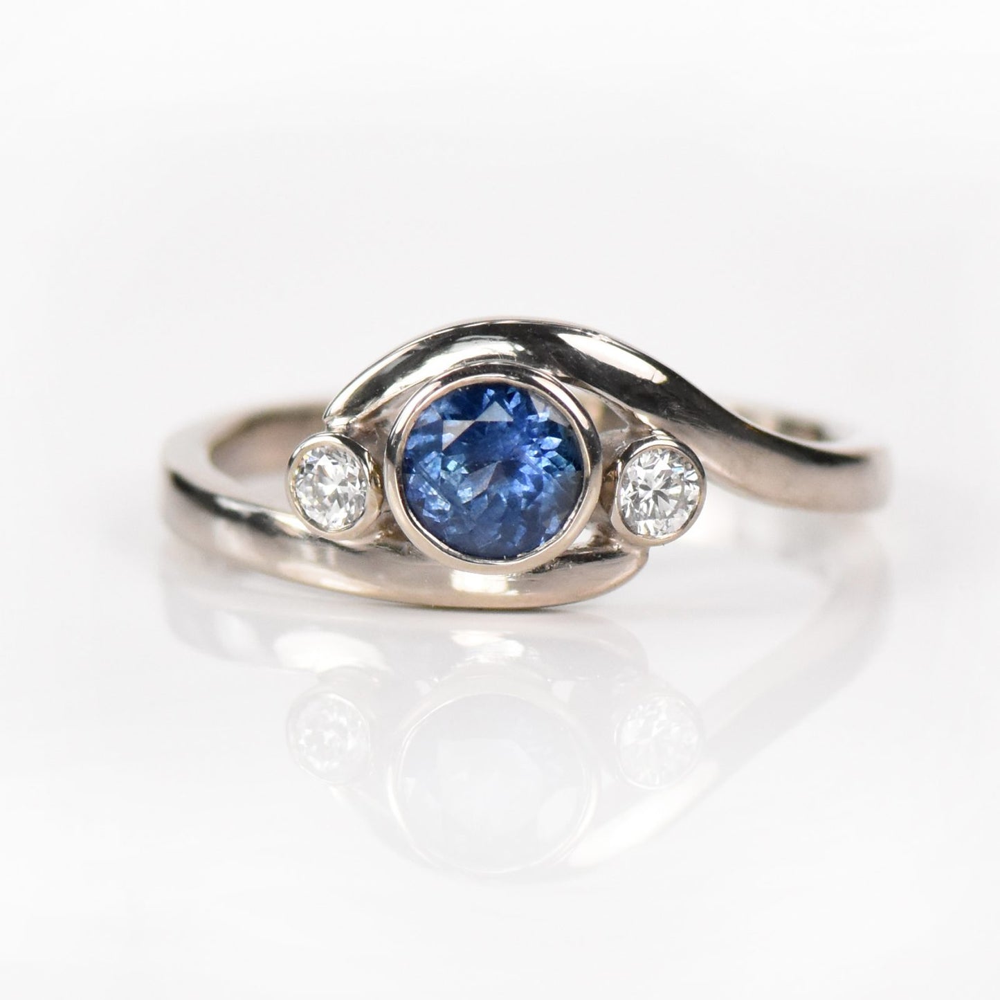 blue sapphire and diamond wave ring