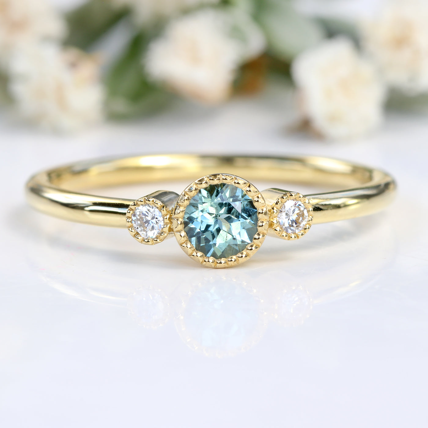 Teal sapphire and diamond engagement ring Clearance