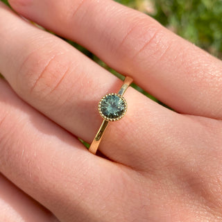 Custom Teal Green Sapphire Solitaire Engagement Ring in 18ct Gold