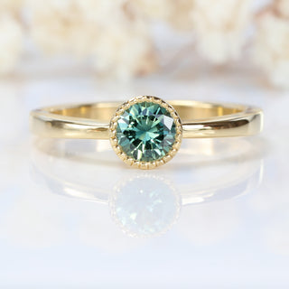 Custom Teal Green Sapphire Solitaire Engagement Ring in 18ct Gold