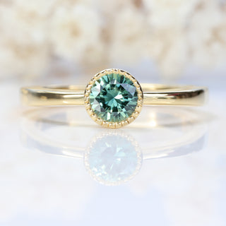 Custom Teal Green Sapphire Solitaire Engagement Ring in 18ct Gold