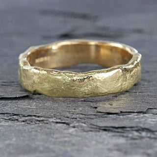 Molten textured 5mm wide 18ct gold men's wedding band, handmade in Cornwall.