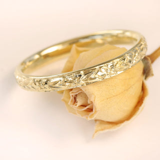 9ct gold 2.5mm court wedding band with hand engraved vintage orange blossom pattern