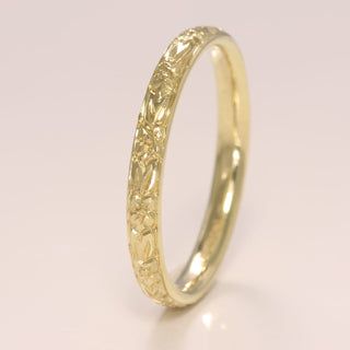 Hand engraved orange blossom wedding band in solid 9ct gold