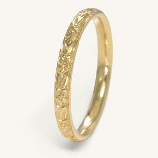 Hand engraved orange blossom wedding band in solid 9ct gold