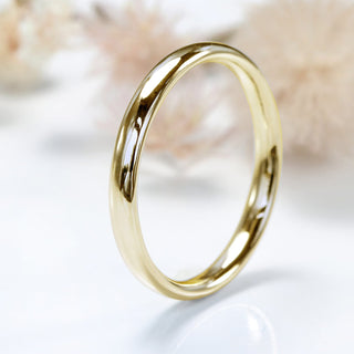 9ct gold 3mm court wedding band on a white surface