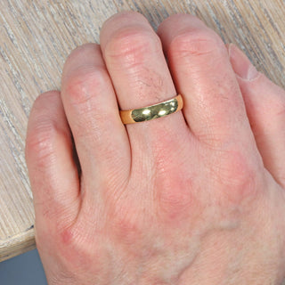 9ct gold 5mm men's wedding band worn on the hand