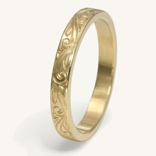 9ct gold wedding band with hand engraved floral scroll pattern