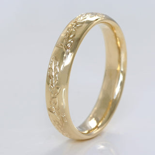 Solid 9ct gold 4mm court profile wedding band with hand engraved oak leaves and acorns