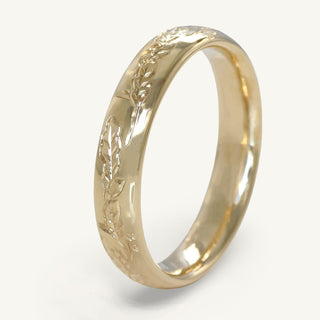 Solid 9ct gold 4mm court profile wedding band with hand engraved oak leaves and acorns