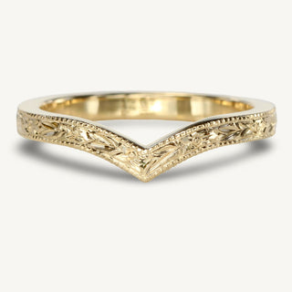 9ct gold 3mm court wedding band with hand engraved bluebells pattern shown on a white surface