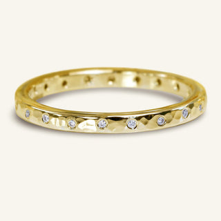 Handmade slim 9ct gold wedding ring with 20 natural diamonds set in a scattered pattern. Finished with a hand-hammered texture
