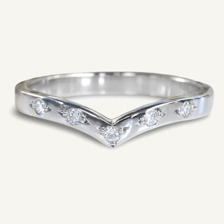 Handmade 950 platinum wishbone wedding ring with five fair trade natural diamonds bead set into the front of the band