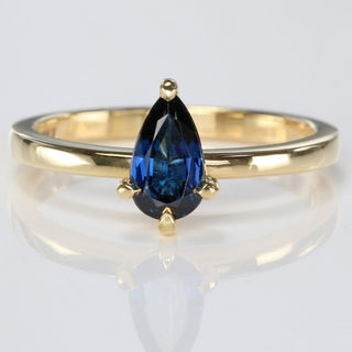 Handmade 18ct gold pear cut deep blue sapphire engagement ring