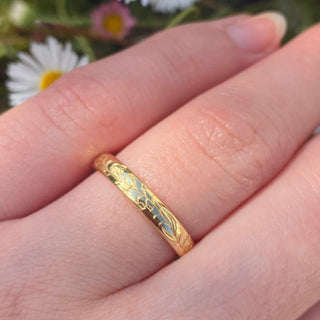 18ct gold 3mm court wedding ring with hand engraved bluebells pattern around the band