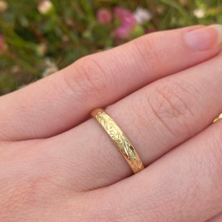 Handmade 3mm court wedding band with engraved bluebells around the band. Made from sustainable solid 18ct gold