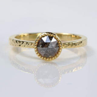Handmade 18ct gold salt and pepper diamond solitaire ring with hammered band and milgrain bezel.
