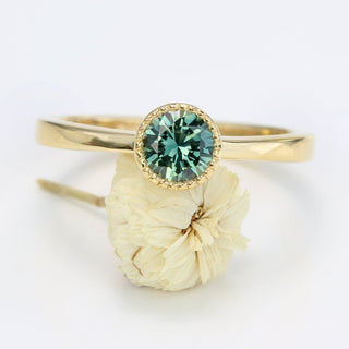 Custom Teal Green Sapphire Solitaire Engagement Ring in 18ct Gold