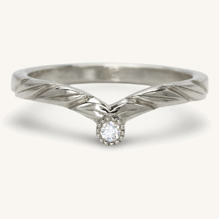 Diamond solitaire wishbone wedding ring handmade from solid 950 platinum. The has hand engraved leaves at the front