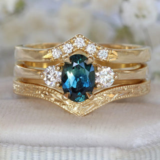 18ct gold deep teal sapphire and diamond trilogy ring with pave down wishbone ring and orange blossom engraved wishbone wedding ring