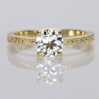 Old cut lab diamond solitaire ring handmade in Cornwall from solid 18ct gold. The band has been engraved with a floral pattern