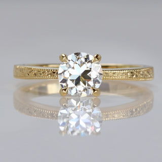 Orange blossom engraved 18ct gold solitaire engagement ring set with a 1 carat old cut lab grown diamond