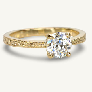 Old European Cut lab diamond solitaire ring, handmade from sustainable 18ct gold. Finished with a floral hand engraved orange blossom pattern