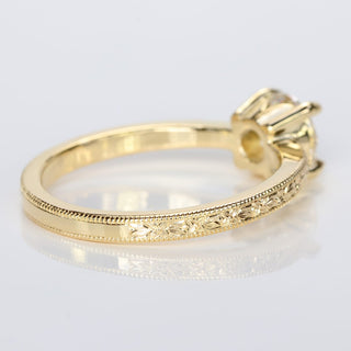 Rear view of 18ct gold hand engraved vintage orange blossom solitaire engagement ring, set with a 1ct old European cut diamond.