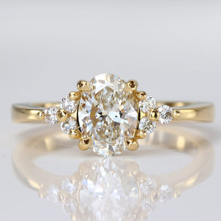 18ct gold oval lab diamond engagement ring in a trefoil design, by Lilia Nash