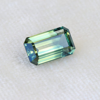 Fair Trade Emerald Cut Parti Sapphire - 8.40 x 4.96mm 1.59ct  SAEM24001