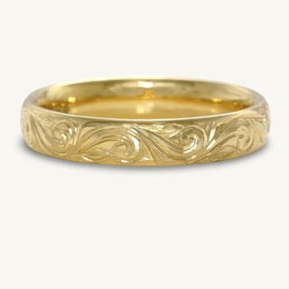Hand engraved 18ct gold wedding ring with hand engraved floral scroll pattern. Suitable for men and women.