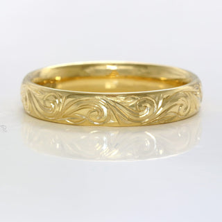 Hand engraved 18ct gold wedding ring with hand engraved floral scroll pattern. Suitable for men and women.