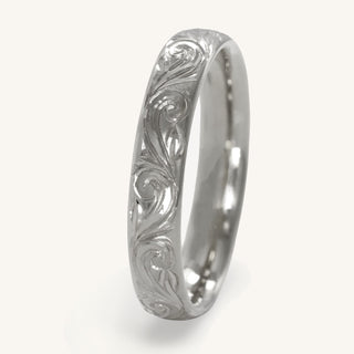 Platinum 4mm court wedding band with hand engraved floral scroll pattern