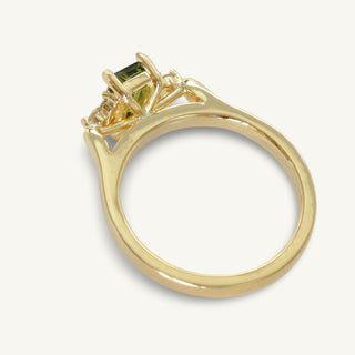 Top view of 18ct gold radiant cut sapphire engagement ring showing the Cathedral setting