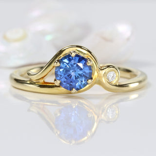 18ct gold Art Nouveau inspired sapphire engagement ring with Canadian diamond