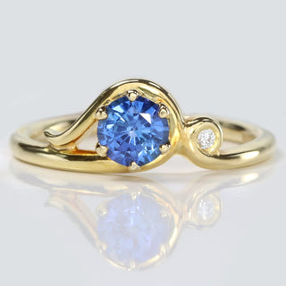 18ct gold Art Nouveau inspired sapphire engagement ring with Canadian diamond accent