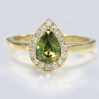 18ct gold pear cut green sapphire and diamond halo engagement ring