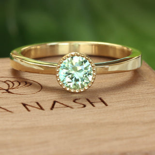 Pale Green sapphire solitaire engagement ring, handmade by Lilia Nash