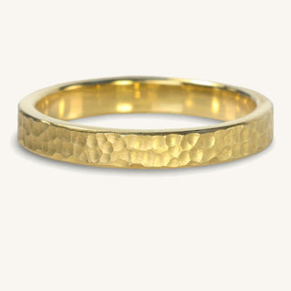 Handmade 3mm wide 18ct gold wedding band with a dappled hammered texture and matte finish