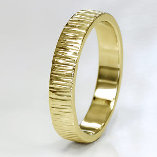 9ct gold wedding band for men with a tree bark texure applied