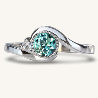 Parti sapphire platinum wave engagement ring, handmade by Lilia Nash