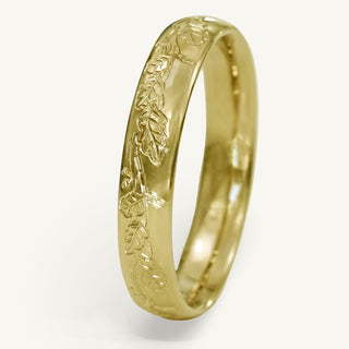 Men's 18ct gold 4mm court wedding band with hand engraved oak eaves