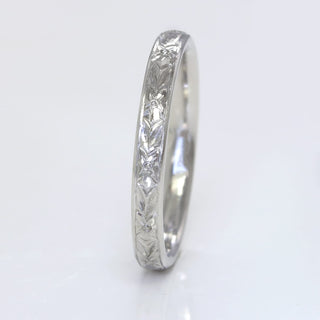 950 platinum 2.5mm court profile wedding ring with hand engraved orange blossom pattern