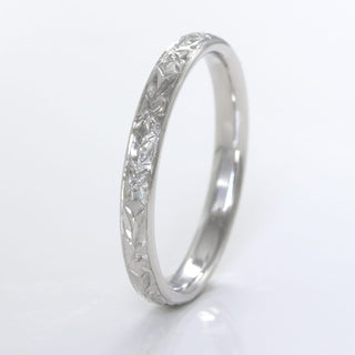 Orange blossom hand engraved platinum wedding ring in a 2.5mm court profile