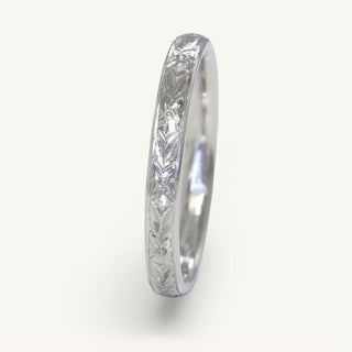 950 platinum 2.5mm court profile wedding ring with hand engraved orange blossom pattern