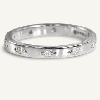 Handmade solid 950 platinum wedding or eternity band bead set with ten natural fair trade diamonds around the band.