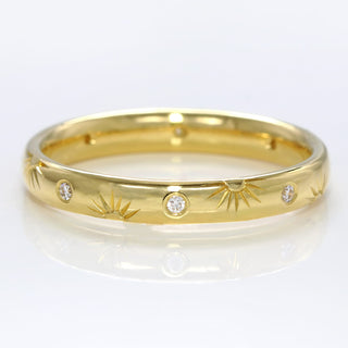 18ct gold 3mm court wedding band with hand engraved suns and diamonds