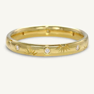 Handmade 18ct gold 3mm court wedding band with engraved suns and diamonds