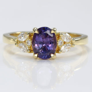 18ct gold oval purple sapphire and diamond cluster engagement ring